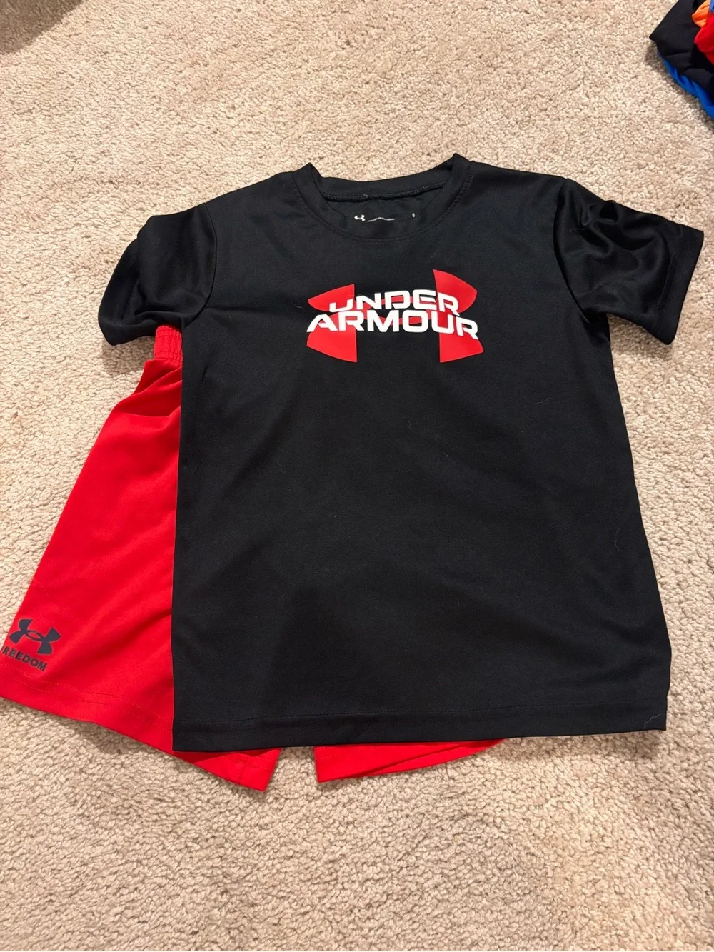 Under Armour Black Tee with Red Logo and Red Shorts